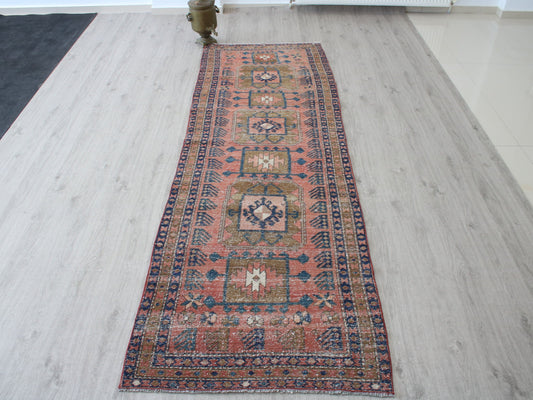 Vintage Turkish runner rug placed in a modern hallway decor