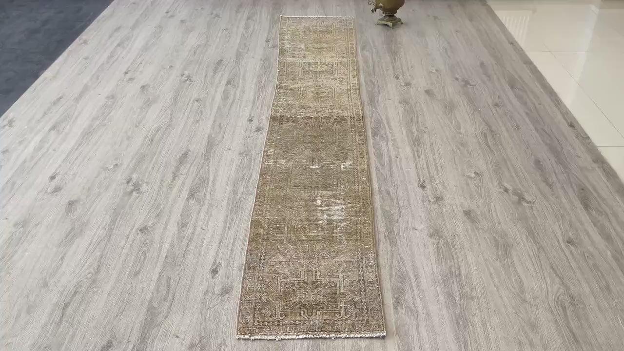 Full view of a vintage pink beige Oushak runner rug 2x9 handwoven wool
