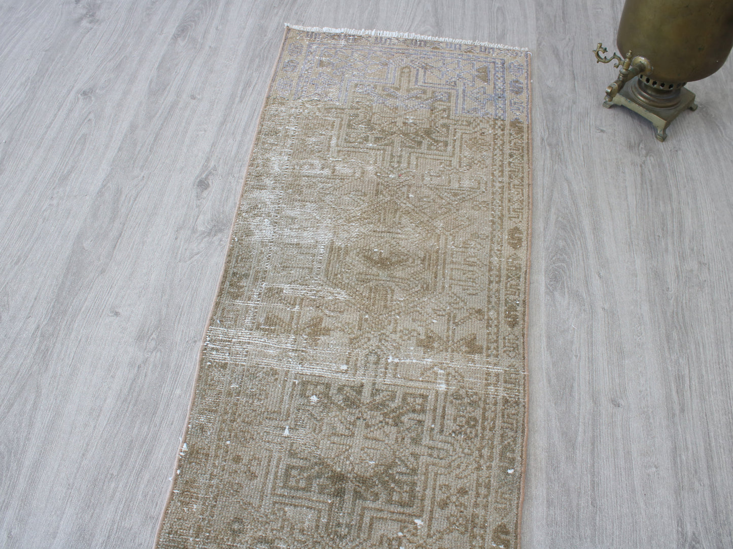 Full view of a vintage pink beige Oushak runner rug 2x9 handwoven wool