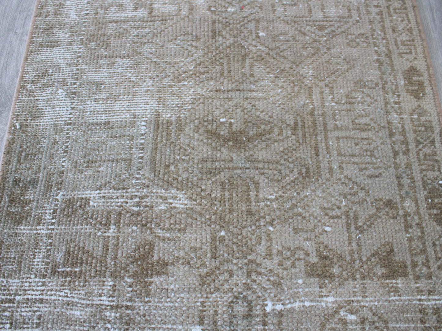 Full view of a vintage pink beige Oushak runner rug 2x9 handwoven wool