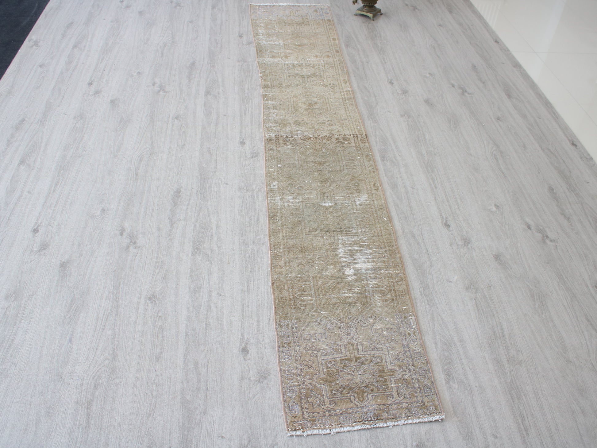Full view of a vintage pink beige Oushak runner rug 2x9 handwoven wool