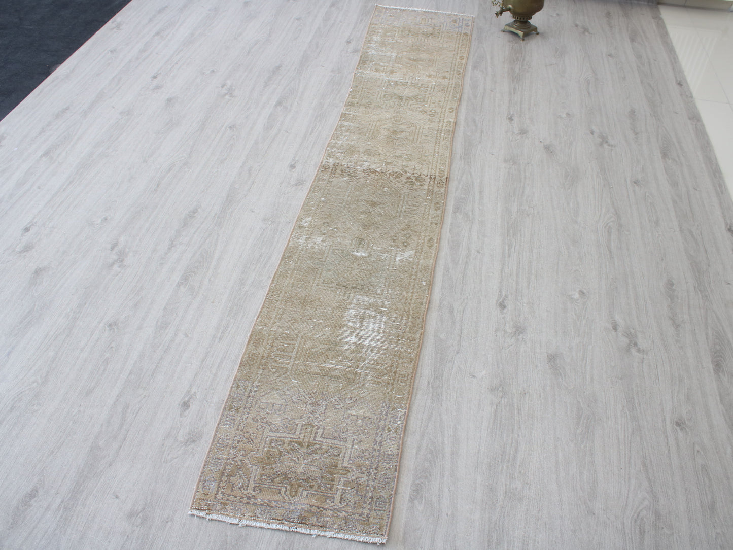 Full view of a vintage pink beige Oushak runner rug 2x9 handwoven wool