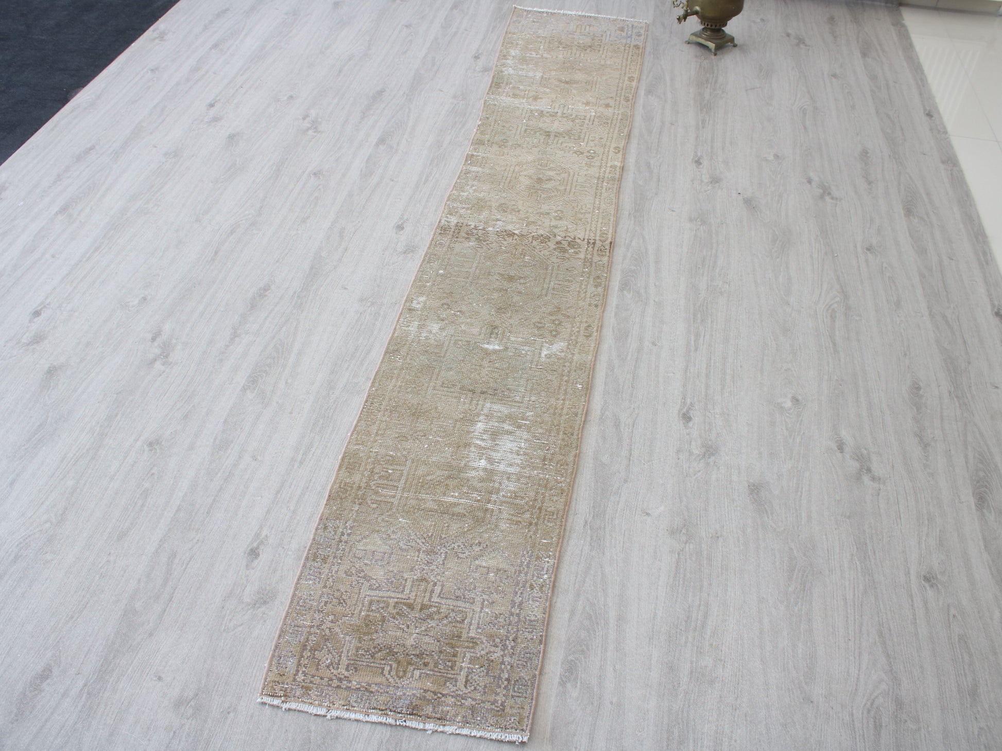 Full view of a vintage pink beige Oushak runner rug 2x9 handwoven wool