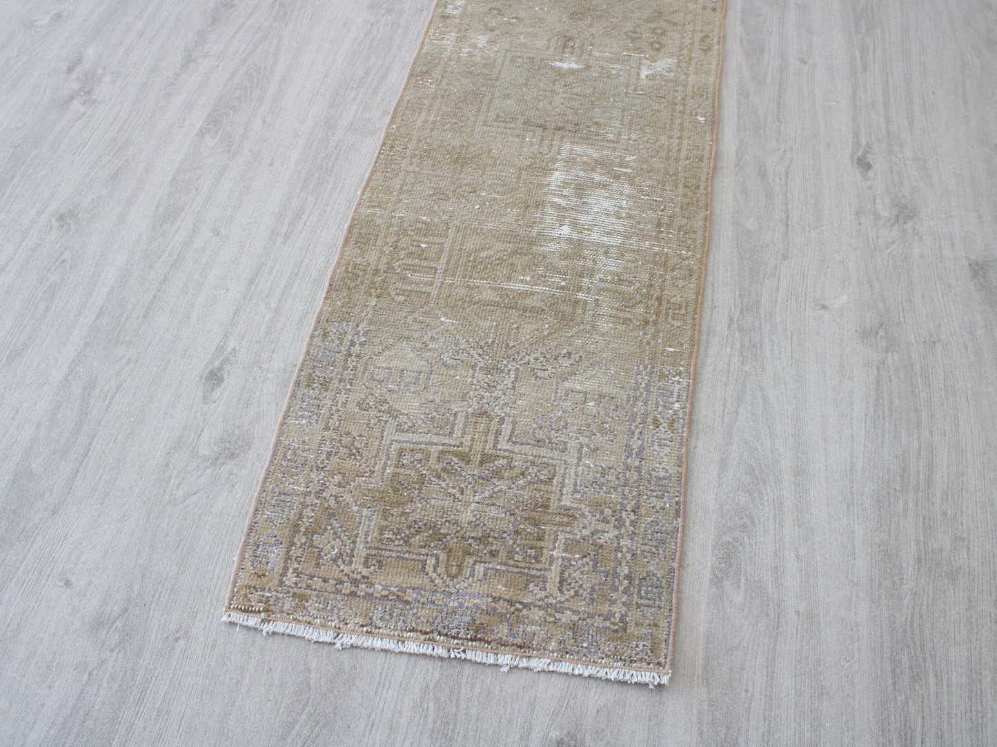 Full view of a vintage pink beige Oushak runner rug 2x9 handwoven wool