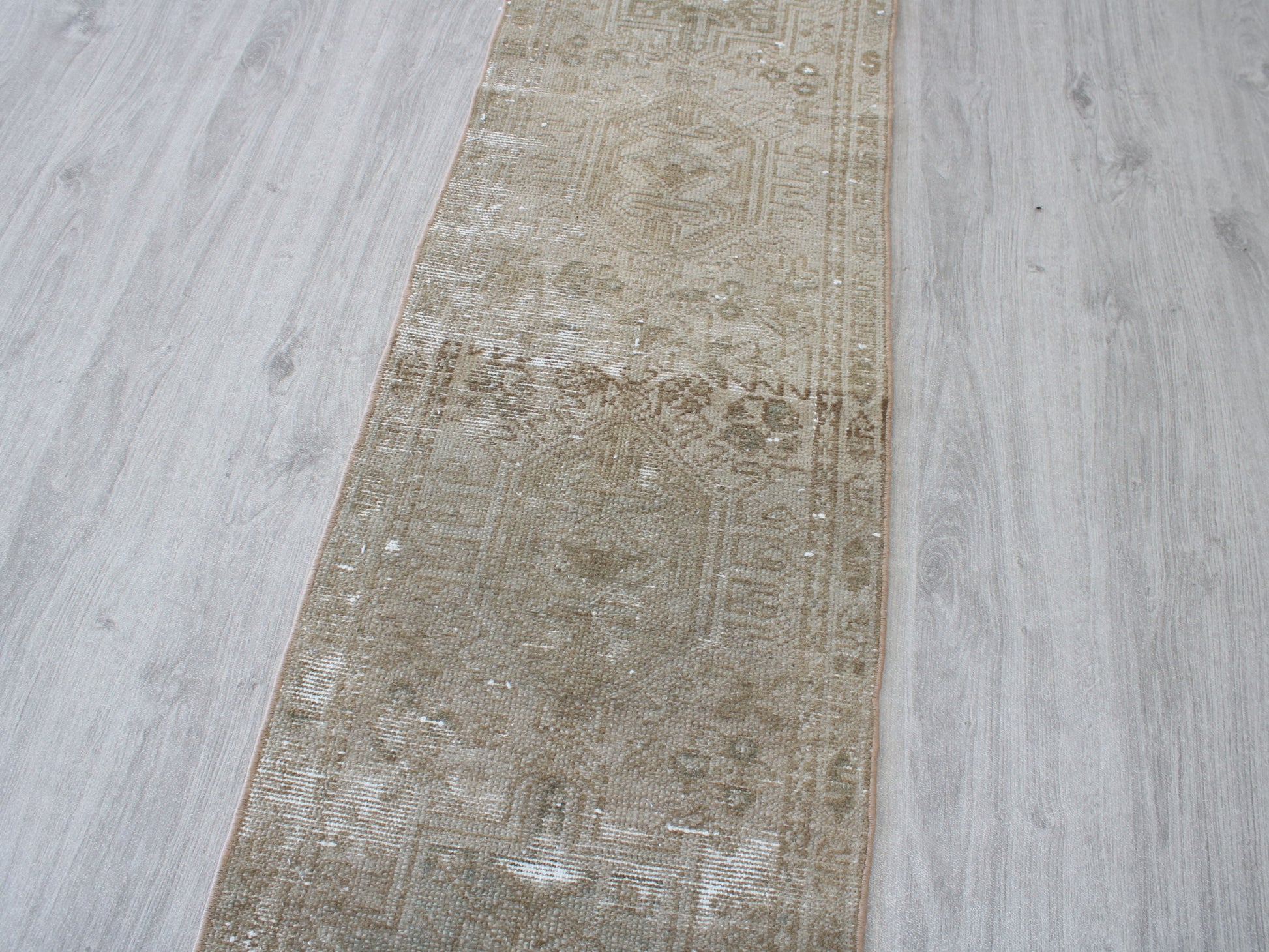 Full view of a vintage pink beige Oushak runner rug 2x9 handwoven wool